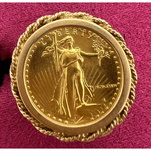 471 - A 1986 Liberty Gold 5 Dollar coin ring set in 14 carat gold. Size O. Weight 7.8gm.