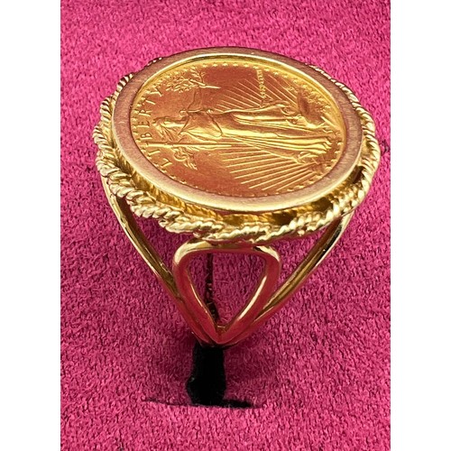 471 - A 1986 Liberty Gold 5 Dollar coin ring set in 14 carat gold. Size O. Weight 7.8gm.