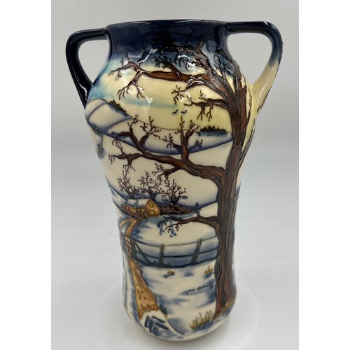 213 - A Moorcroft “Woodside Farm” twin handled vase. 25.5cm h.