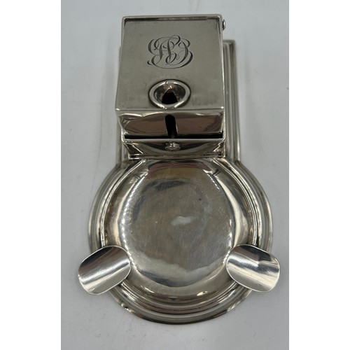 727 - A hallmarked silver table cigar cutter and ashtray. Birmingham 1908, maker’s marks rubbed. Weight 11... 