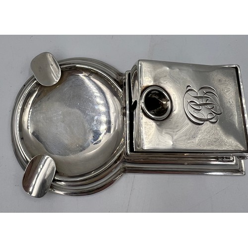 727 - A hallmarked silver table cigar cutter and ashtray. Birmingham 1908, maker’s marks rubbed. Weight 11... 