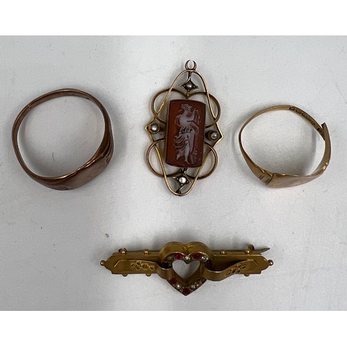 484 - Nine carat gold jewellery to include two rings, a brooch and a cameo set pendant. Total weight 12.65... 