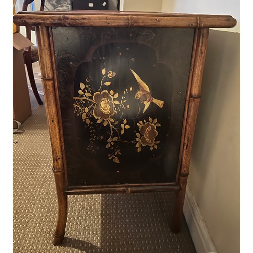 99 - A 19thC bamboo and lacquer kneehole desk with brass drop handles. 90cm w x 51cm d x 76cm h.