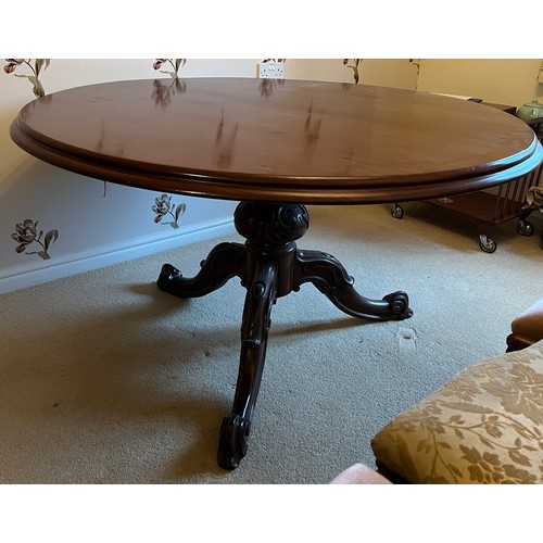 98 - A 19thC mahogany tilt top dining table 139cm d.