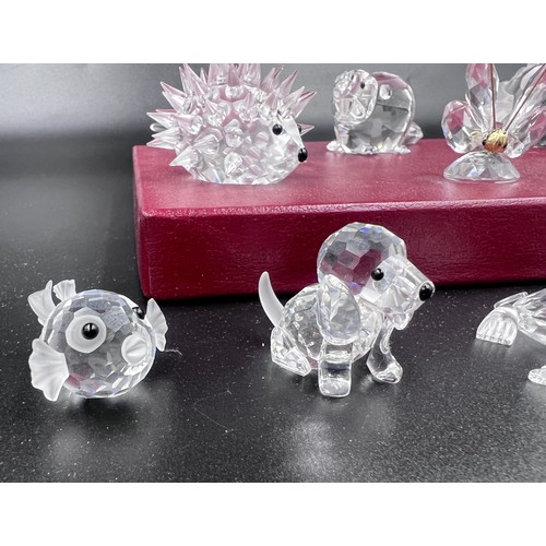 288 - A collection of 12 Swarovski Silver Crystal boxed ornaments to include 7644 Fish, 7616 Beaver, 7609 ... 