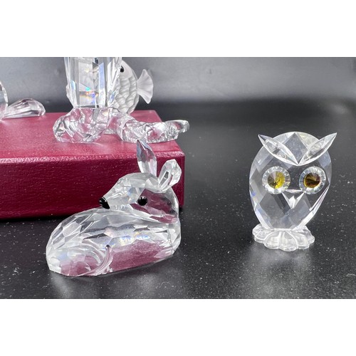 288 - A collection of 12 Swarovski Silver Crystal boxed ornaments to include 7644 Fish, 7616 Beaver, 7609 ... 