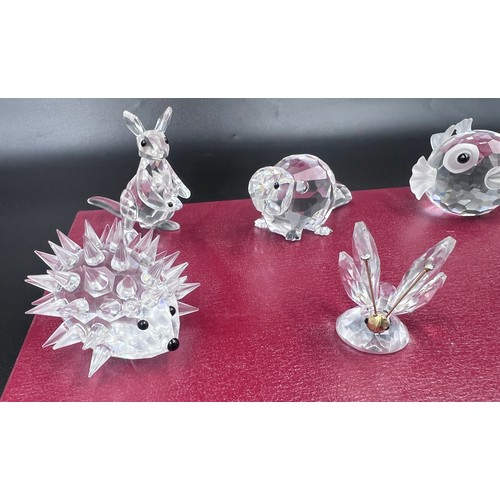 288 - A collection of 12 Swarovski Silver Crystal boxed ornaments to include 7644 Fish, 7616 Beaver, 7609 ... 