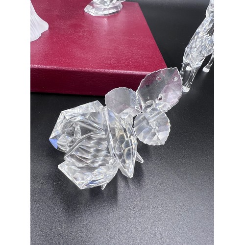 292 - Eight boxed pieces of Swarovski crystal to include 7637 Grizzly Bear measuring approx. 8.5cm h x 9cm... 