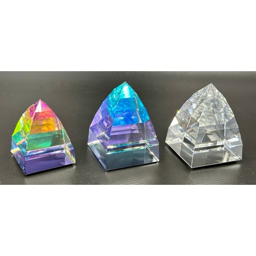 294 - Three Swarovski 7450 pyramids. Smallest 5.5cm h, other two 7cm approx.