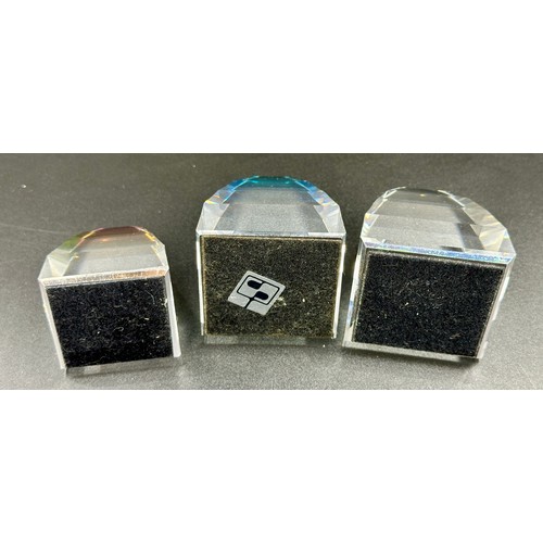 294 - Three Swarovski 7450 pyramids. Smallest 5.5cm h, other two 7cm approx.