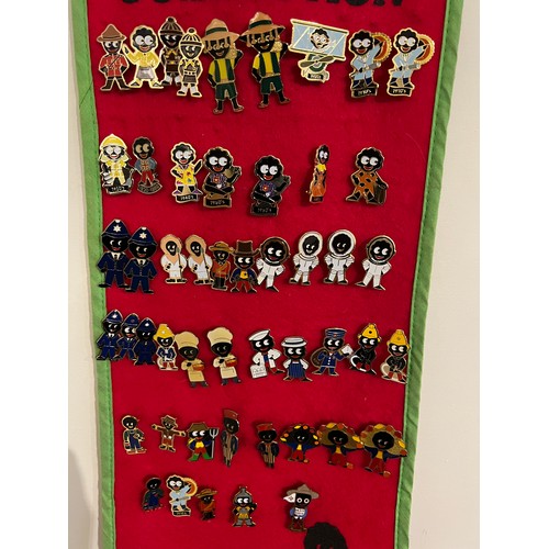 273 - Fifty various Robertsons ‘Golly’ badges on ‘Golly Brooch collection red felt wall hanging, to includ... 