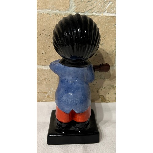 274 - A Carlton Ware Golly figure playing a banjo No. 2/250, 20cm h. 
This item is listed on the basis the... 