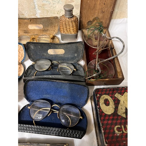 1030 - An interesting miscellany to include pewter pepperette, treen sifter, vintage spectacles, glass and ... 