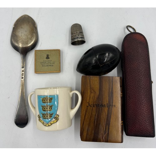 1028 - A miscellaneous lot to include a miniature leather cased thermometer, hallmarked silver preserve spo... 