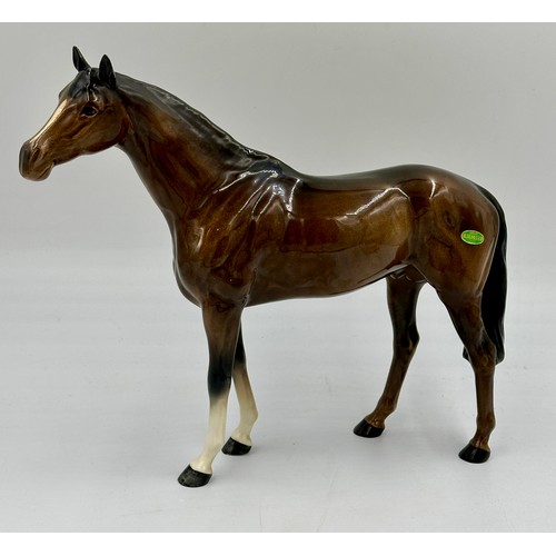 248 - Three Beswick bay horses to include large horse 28cm h. Two smaller horses with stamps underneath, l... 