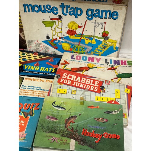 865 - A collection of board games to include Mouse Trap Game, Show Jumping, Bell's Loony Links, Stickle Br... 