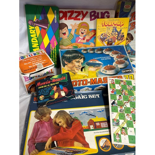 866 - A collection of board games to include Walt Disney's Pinocchio Race Game, Snakes & Ladders, Baffle B... 