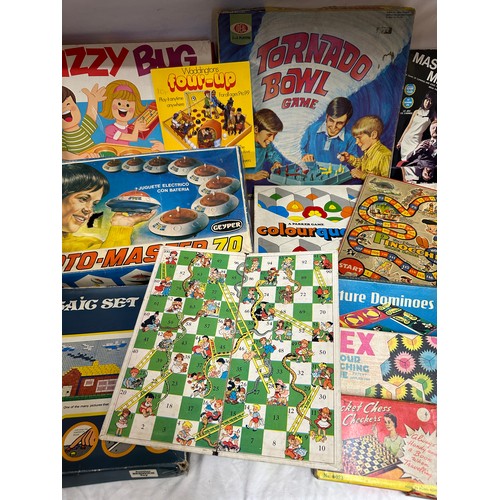 866 - A collection of board games to include Walt Disney's Pinocchio Race Game, Snakes & Ladders, Baffle B... 