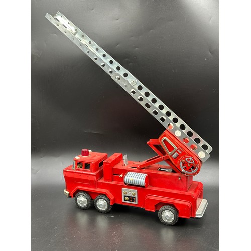 877 - Tin plate toys to include Y-3 Firetruck, Codeg toy till, Codeg telephone exchange Tri-ang KL44 crane... 