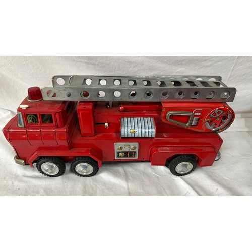 877 - Tin plate toys to include Y-3 Firetruck, Codeg toy till, Codeg telephone exchange Tri-ang KL44 crane... 