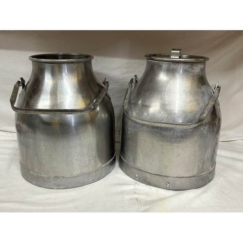 141 - Two Rostfritt Stal churns. 38.5 cm h with lid.