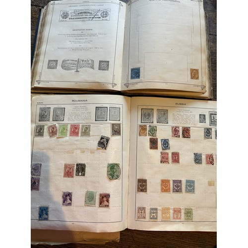 587 - Four world printed albums with mainly world stamps, some GB.