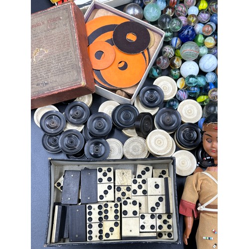 864 - Collection of vintage toys and tins to include marbles, bone dominoes, draughts, card games and 3 so... 