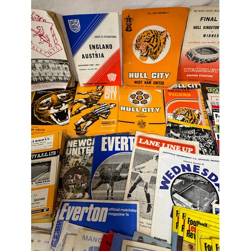 745 - A quantity of 1960/70/80's football programmes to include Hull City and Leeds United etc. Together w... 