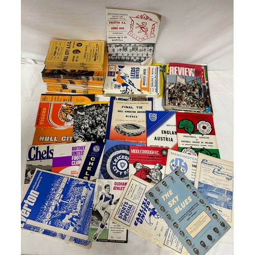 745 - A quantity of 1960/70/80's football programmes to include Hull City and Leeds United etc. Together w... 