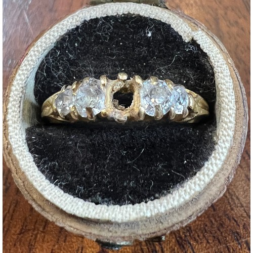 491 - Five stone diamond ring set in unmarked yellow metal. Central stone loose and needs resetting. Size ... 