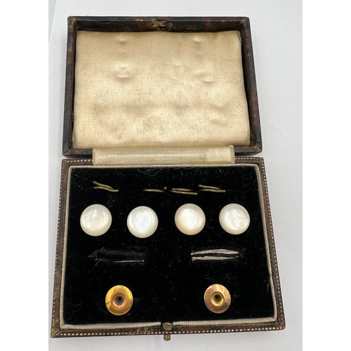 496 - Boxed collar studs, one 18 carat gold, the other 9 carat gold and four mother of pearl shirt buttons... 