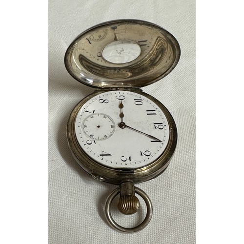 562 - A silver half Hunter pocket watch engraved C.W.Park presented by the Rates Staff N.E.RLY York Sep 30... 