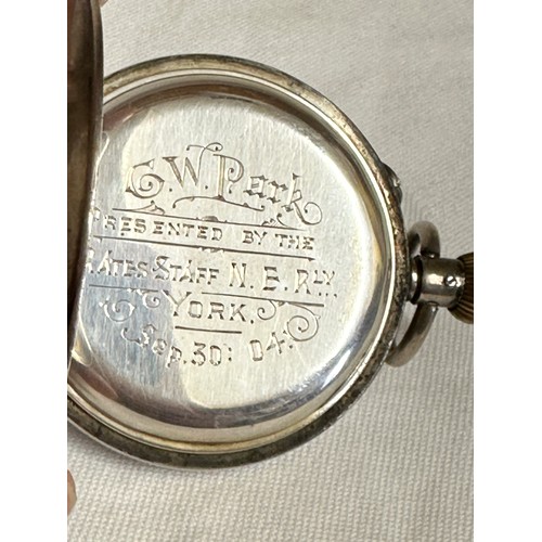 562 - A silver half Hunter pocket watch engraved C.W.Park presented by the Rates Staff N.E.RLY York Sep 30... 