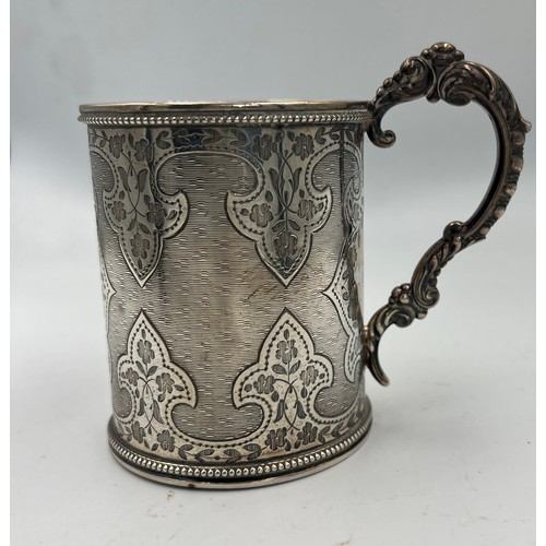 740 - A silver tankard London 1866, maker GA 8.5cm h. Weight 142gm.