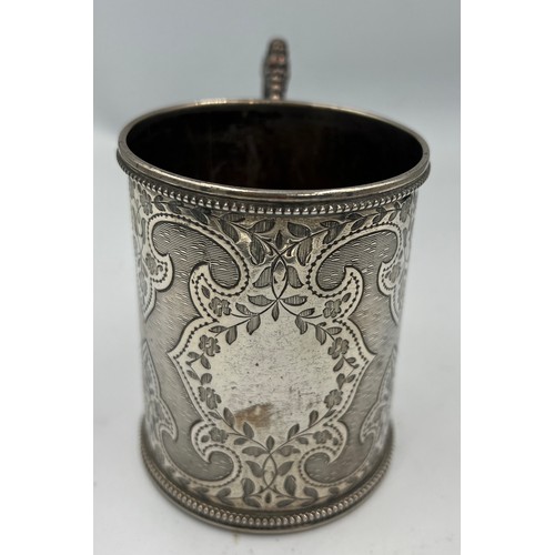 740 - A silver tankard London 1866, maker GA 8.5cm h. Weight 142gm.