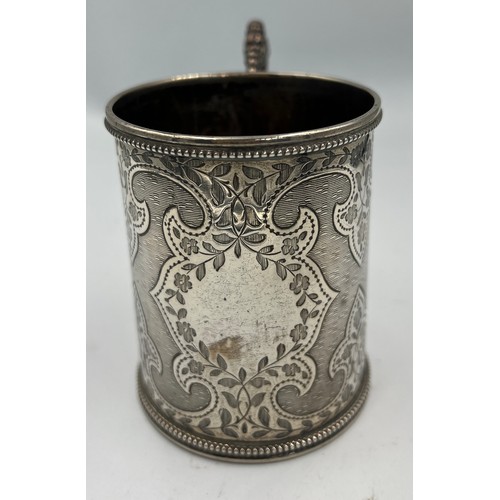 740 - A silver tankard London 1866, maker GA 8.5cm h. Weight 142gm.