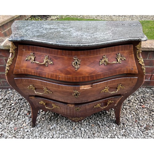 108 - A continental parquetry inlaid bombe fronted commode of three drawers with ormolu mounts and marble ... 