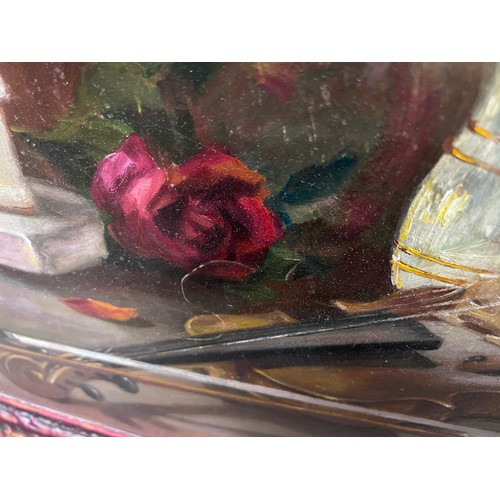 1192 - An oil on board, possibly Dutch of still life depicting violin, rose and a Pierrot. Signed l.l. indi... 