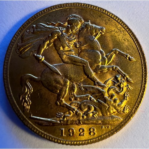 594 - A George V, 1910-1936 sovereign, 1928. 8gm.