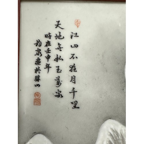 270 - A framed Chinese porcelain plaque of a winter landscape. Visible plaque 36.5 x 24cm.