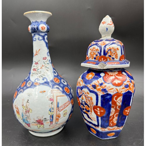 265 - A pair of Oriental vases, bottle vase 24cm h, the other lidded vase probably Japanese Imari, 23cm h.