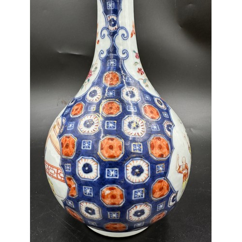 265 - A pair of Oriental vases, bottle vase 24cm h, the other lidded vase probably Japanese Imari, 23cm h.