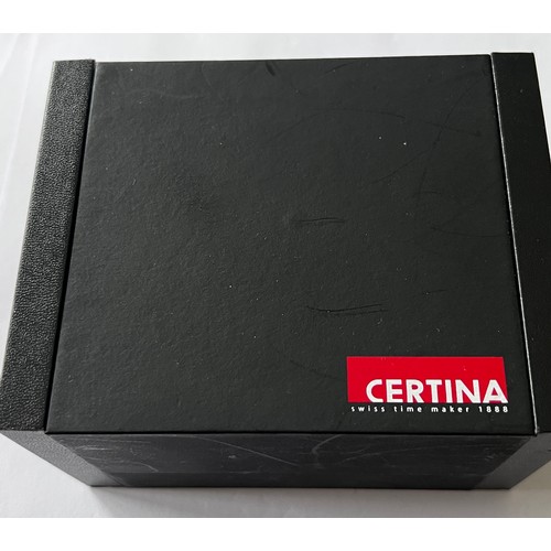 569 - A Certina DS battery operated wristwatch with date aperture on gold and silver coloured bracelet. In... 