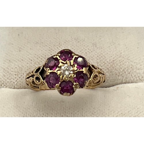 513 - A 9 carat gold ring set with pink and clear stones, size J, weight 2.4gm.