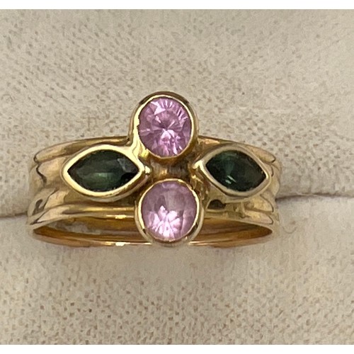 516 - A 14 carat gold gem set ring. Size P. Weight 2gm.