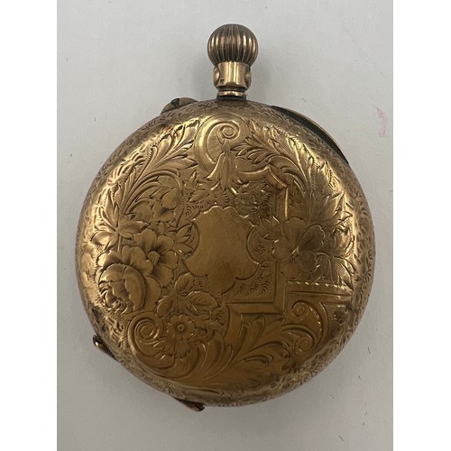 572 - A 14 carat gold cased continental pocket watch with enamel dial. 3cm d.