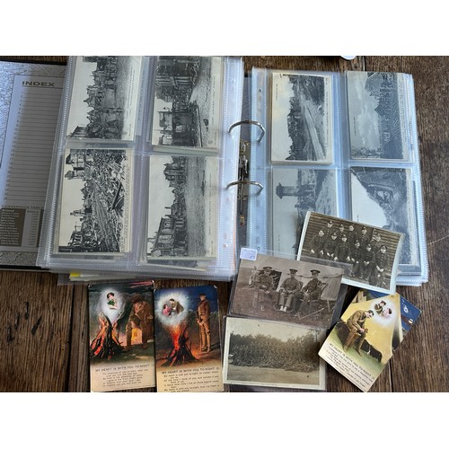 756 - A large collection of World War I & II postcards depicting soldiers, artillery tanks, camps, many bo... 