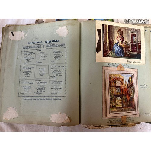 759 - A miscellany of ephemera to include scrap books largest to include greetings cards, calendars and ma... 