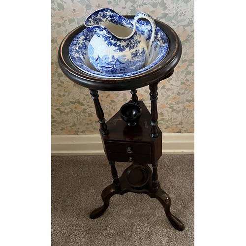 132 - Mahogany washstand with blue and white jug and bowl. 86cm h.