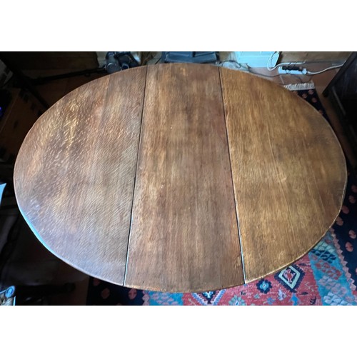 41 - An oak gateleg dining table. 108cm w x 39cm d x 74cm h, closed, open 135cm l.